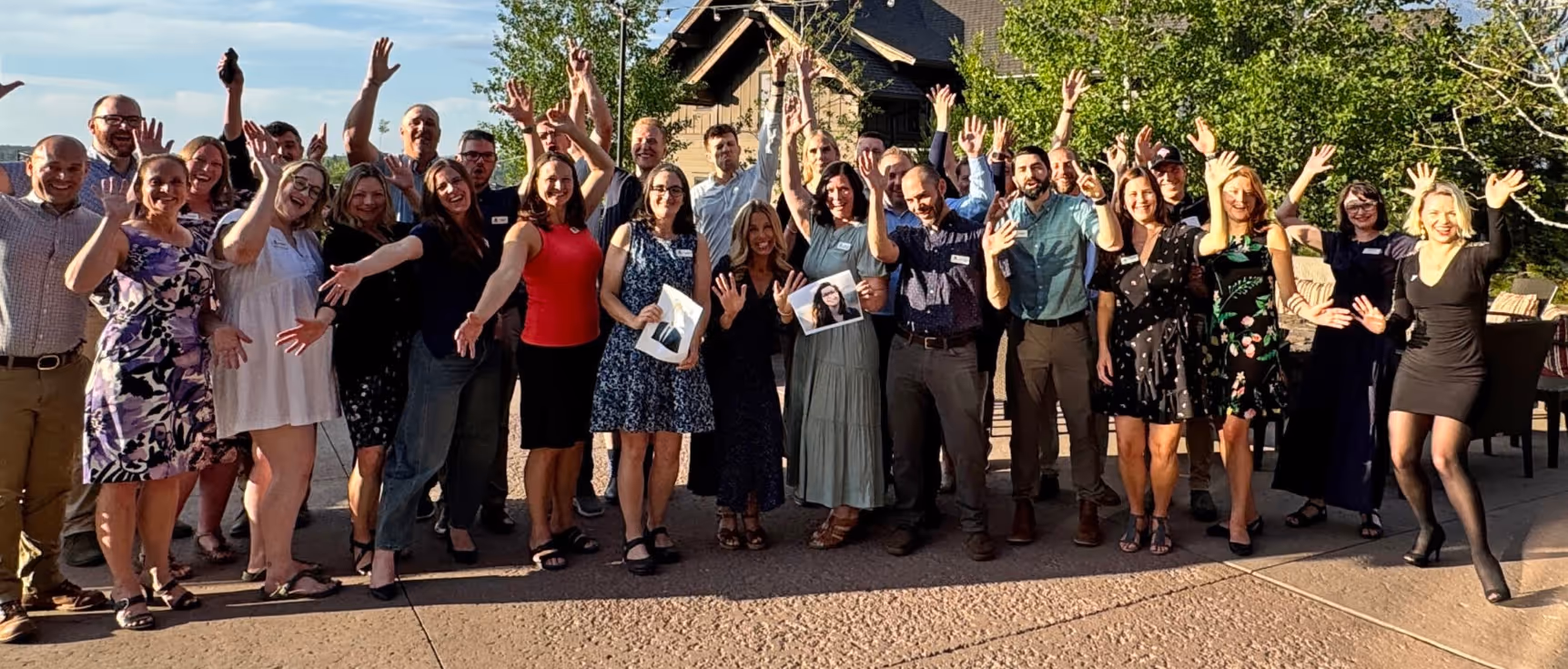 A group of people standing next to each other.
