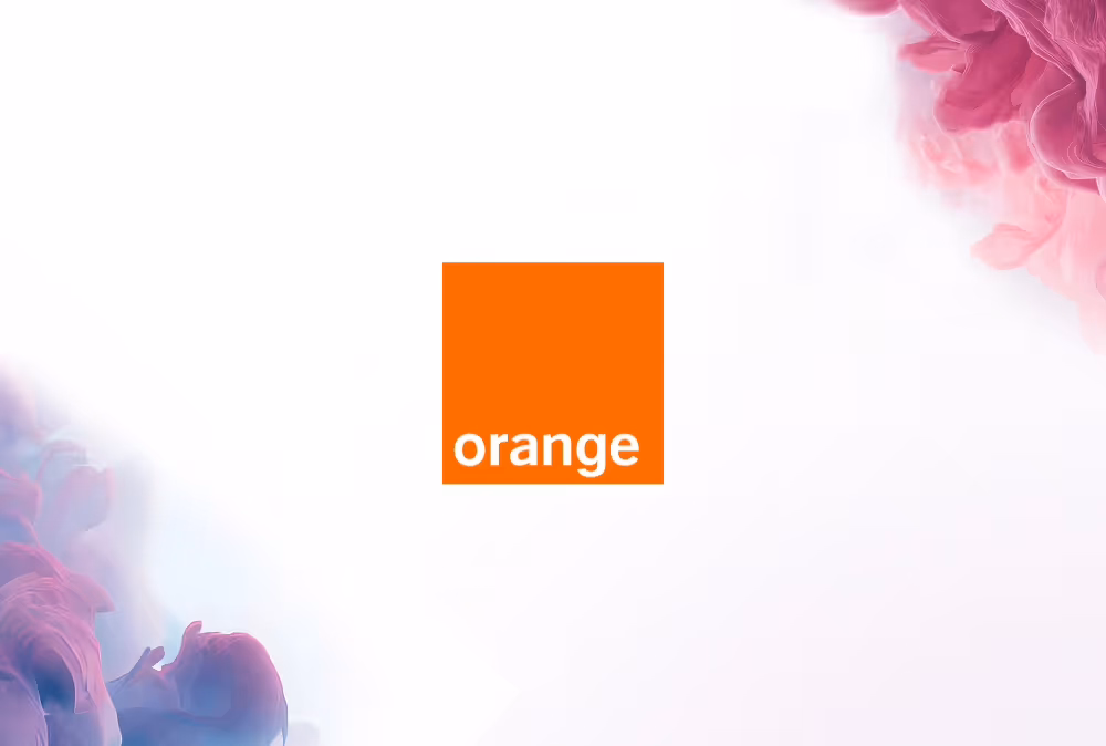 Orange logo with white text inside an orange square on a white background with pink and purple smoke.