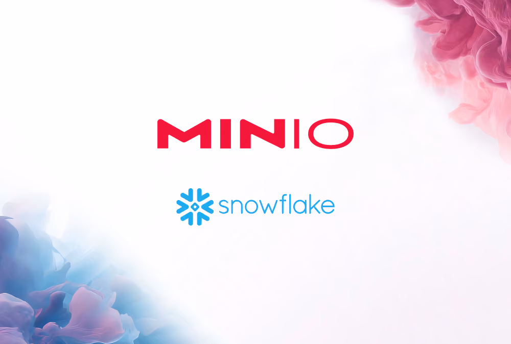 The MinIO logo in red above the blue Snowflake logo on a white background with pink and blue smoke.