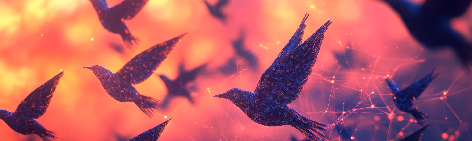 Abstract digital birds composed of blue interconnected lines flying against a warm orange and pink background.