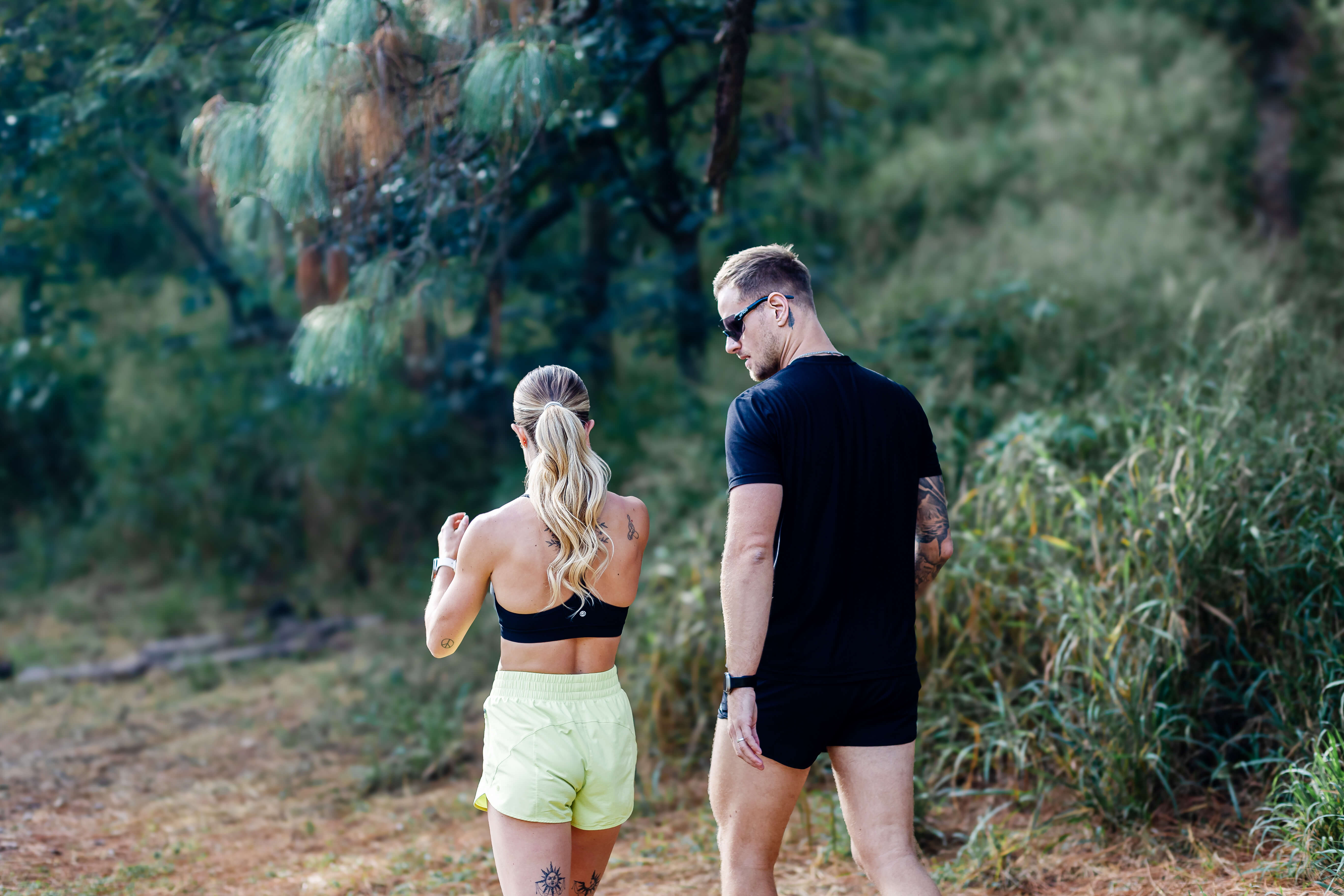 Call center agent looking to her screen on the side and smiling