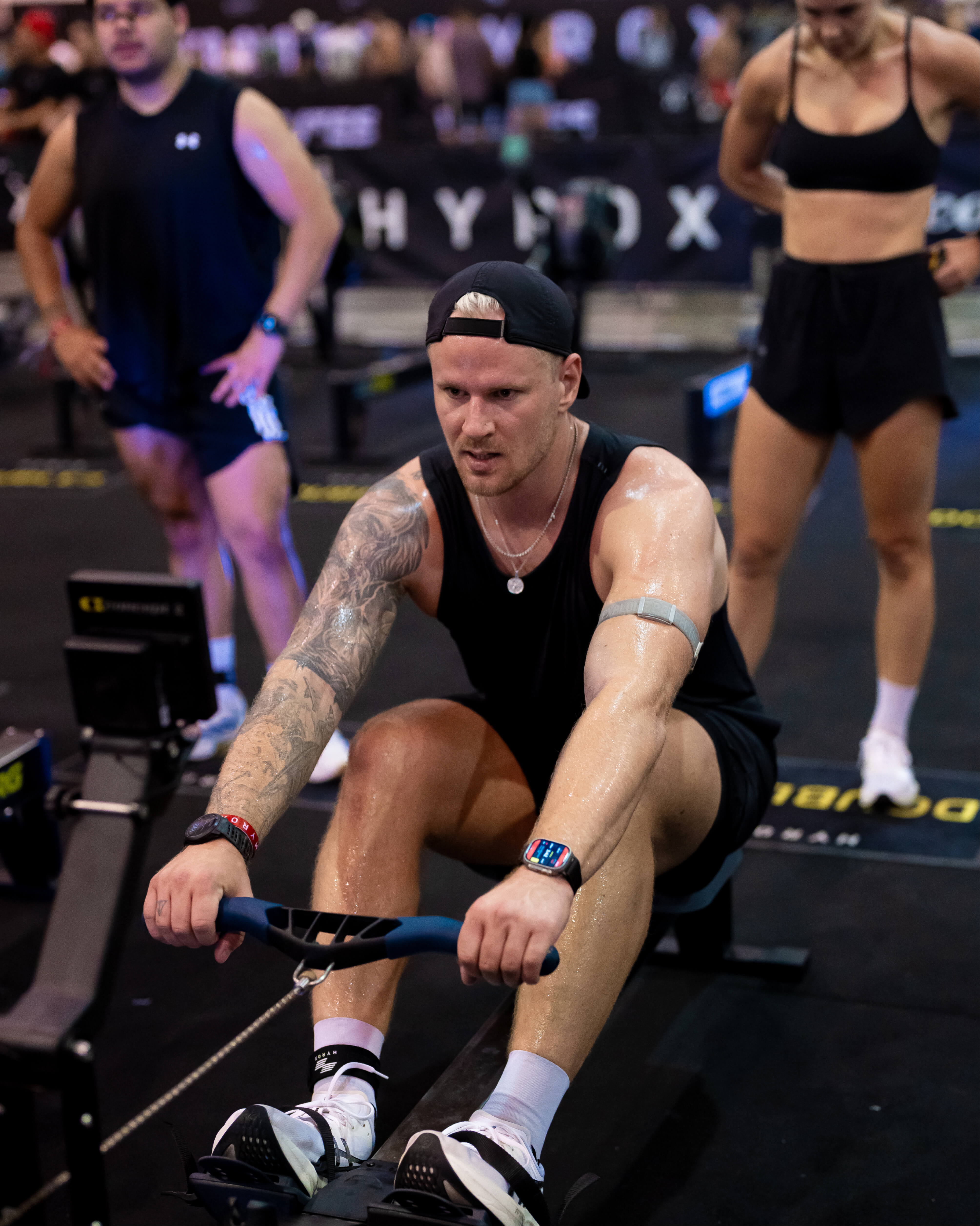 Call center agent looking to her screen on the side and smiling