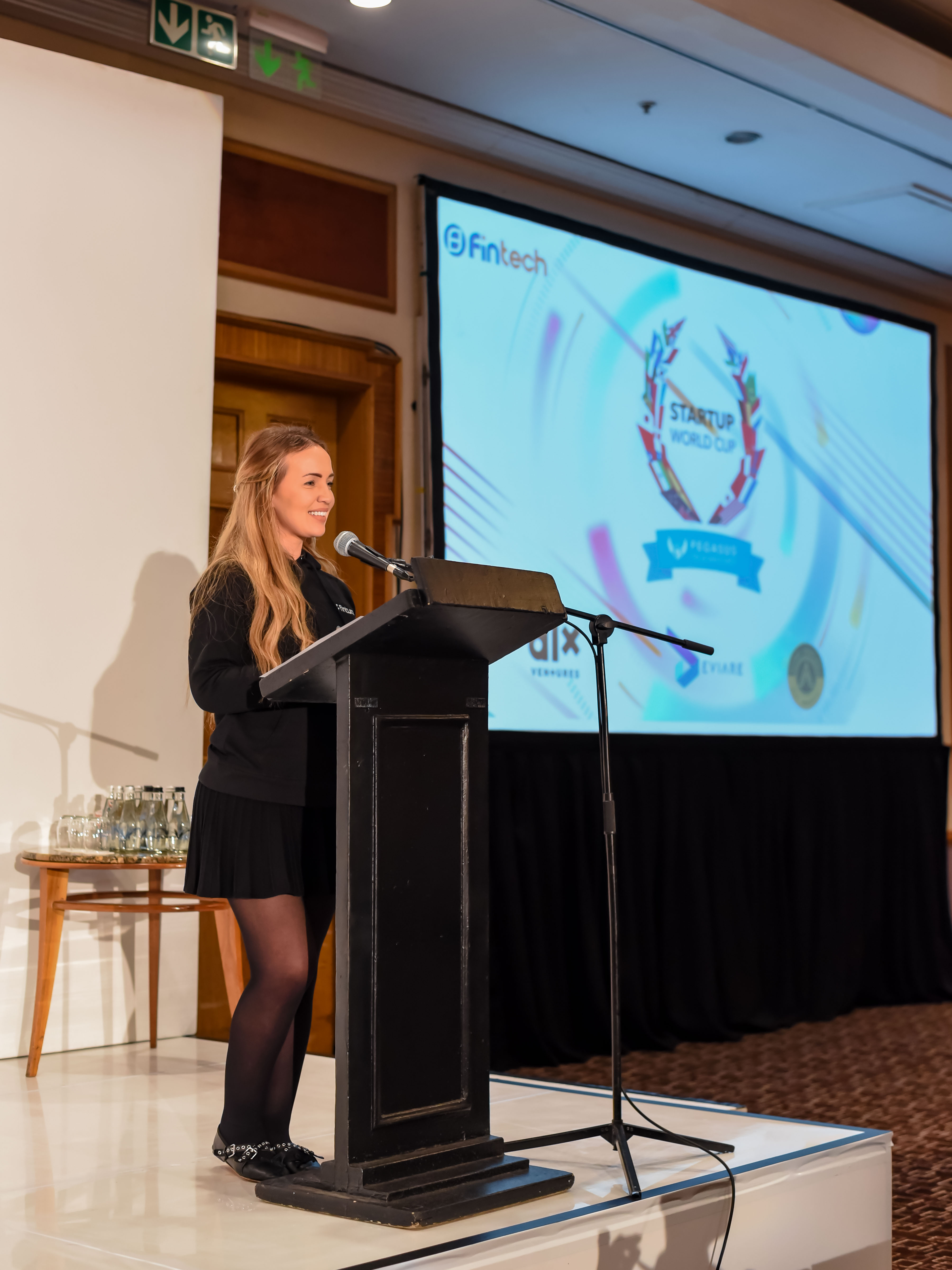 Fintura CEO Bernice presenting the winning pitch at the South African Startup World Cup finals 2025