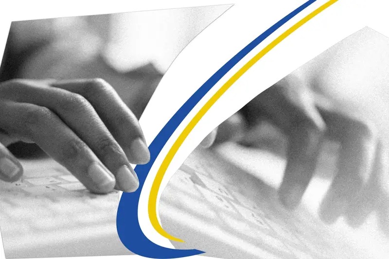 closeup hands typing on keyboard