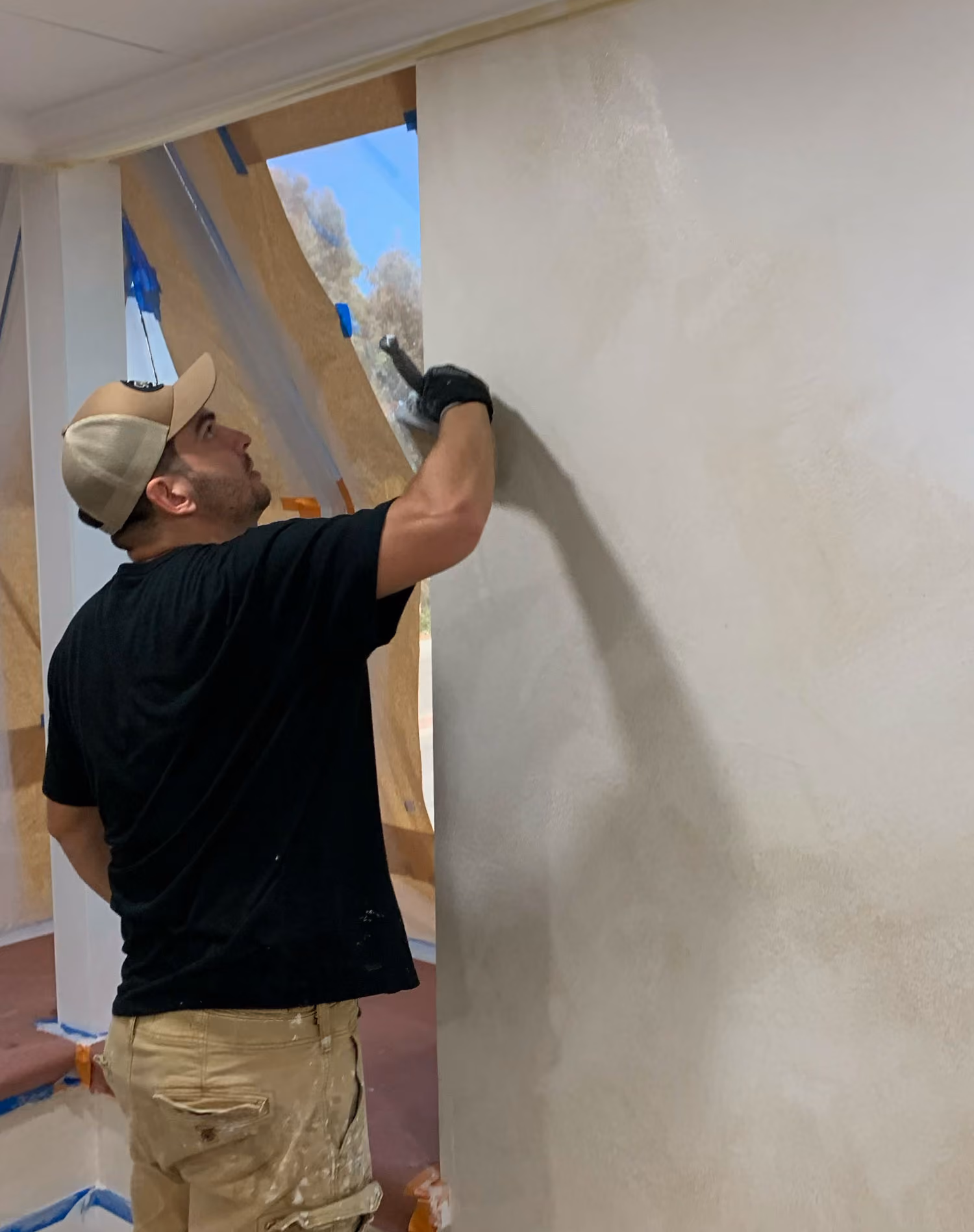 Limewash wall finish in a modern Orange County living room by Riot Renovation.
