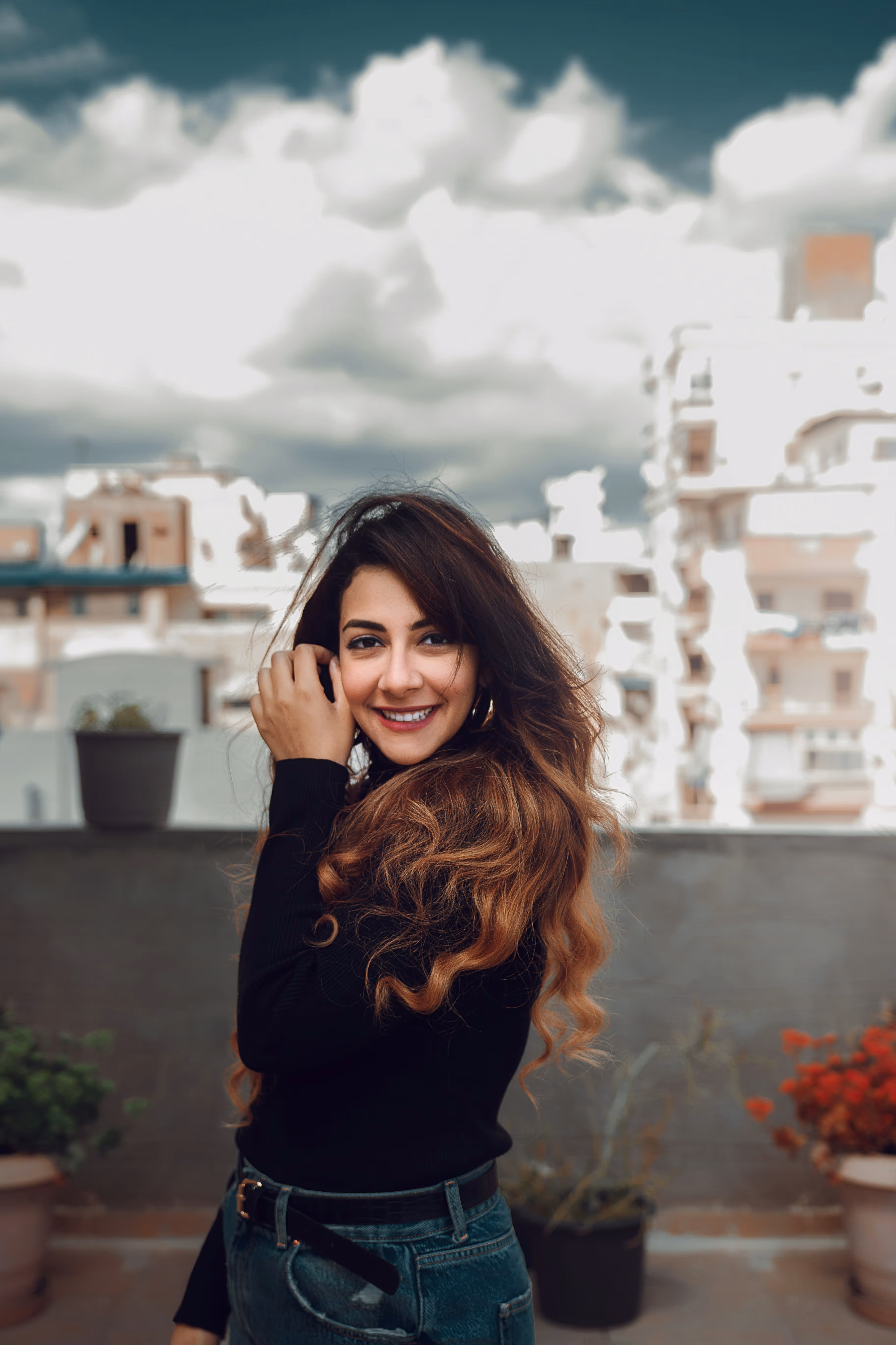 Photo of brunette woman smiling at camera