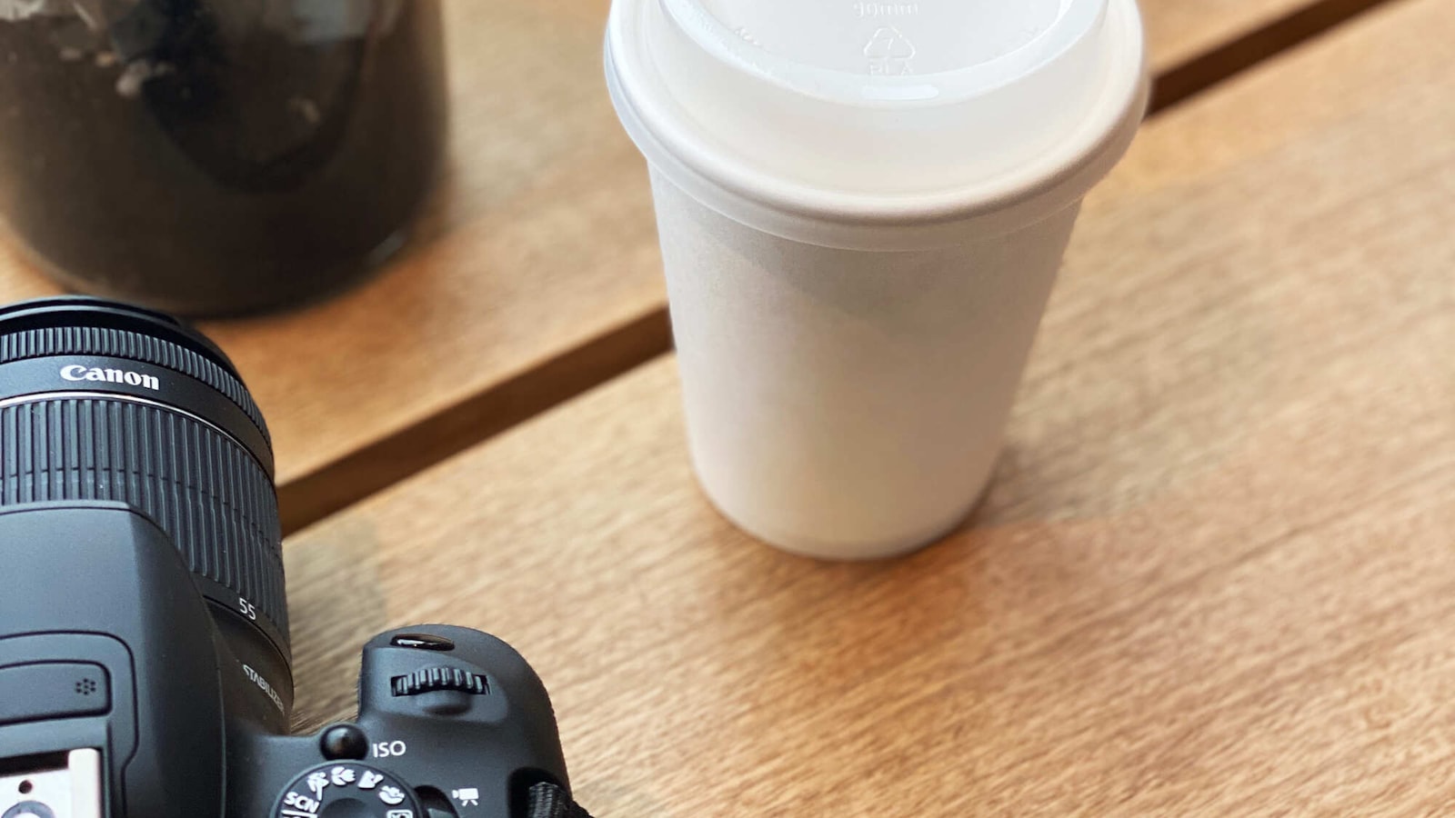 A camera on a desk, illustrating professional short-term rental listing photography