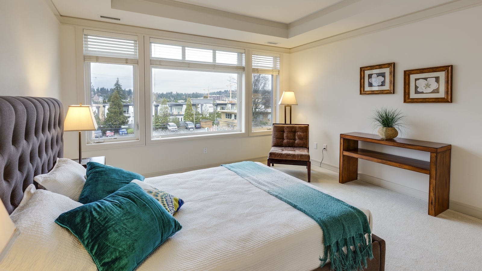 A bright, fully furnished bedroom interior, illustrating a short-term rental furnishing checklist