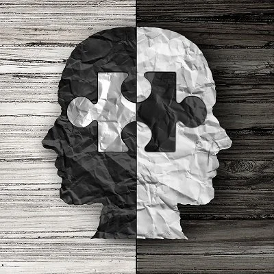 Student taking notes while paraphrasing academic text to avoid plagiarism.