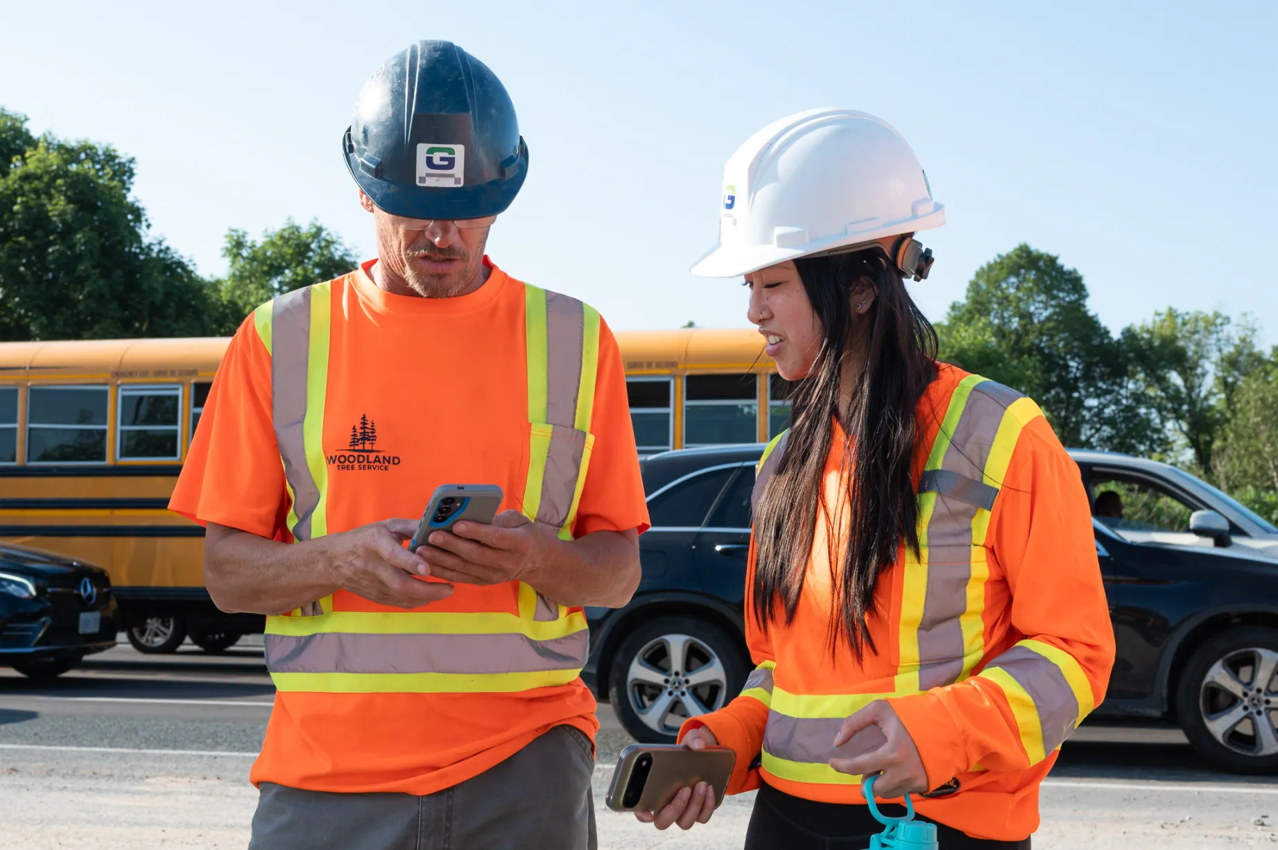 safety managers using mobile device