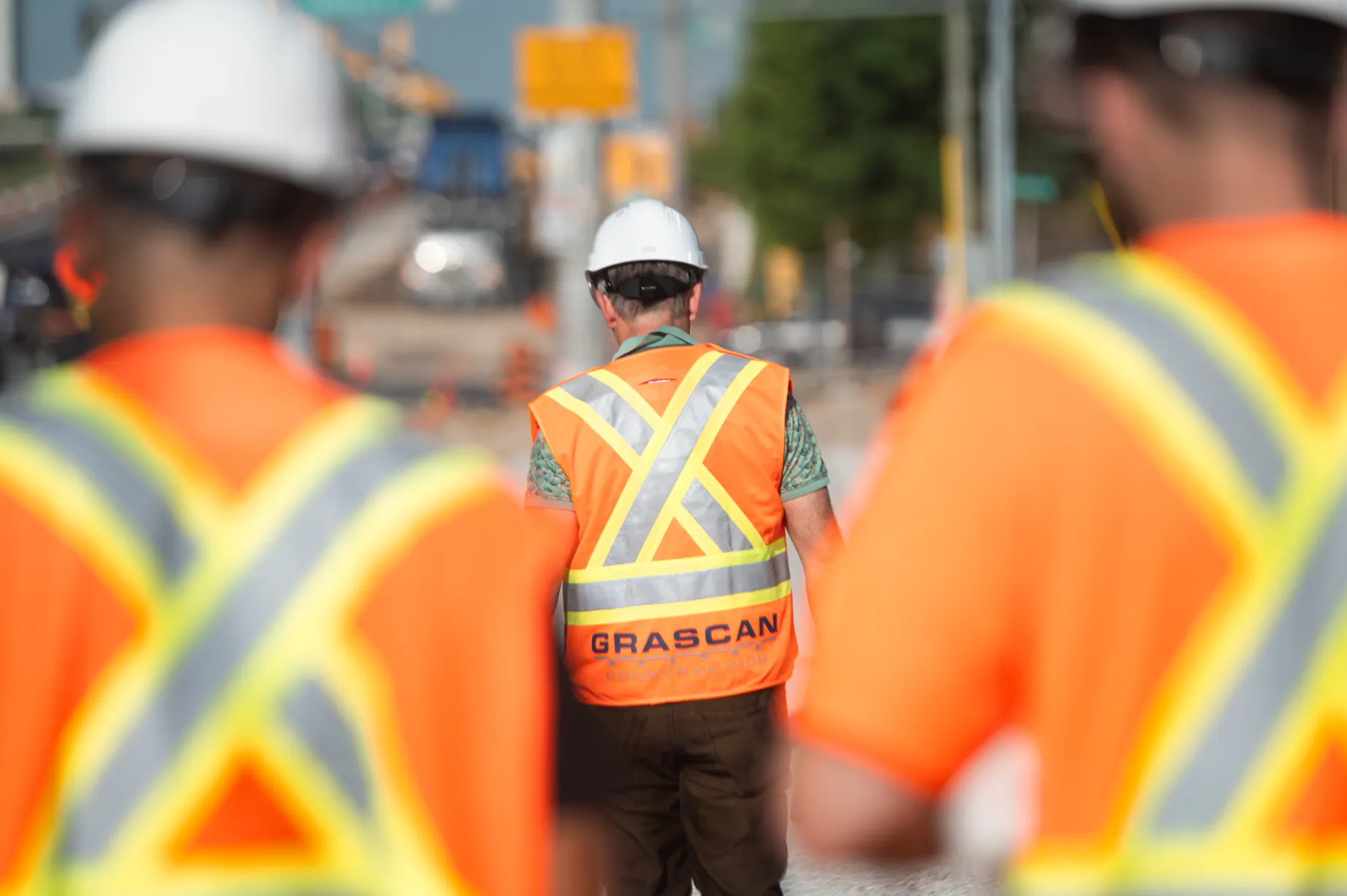 Men wearing canadian hi vis jackets