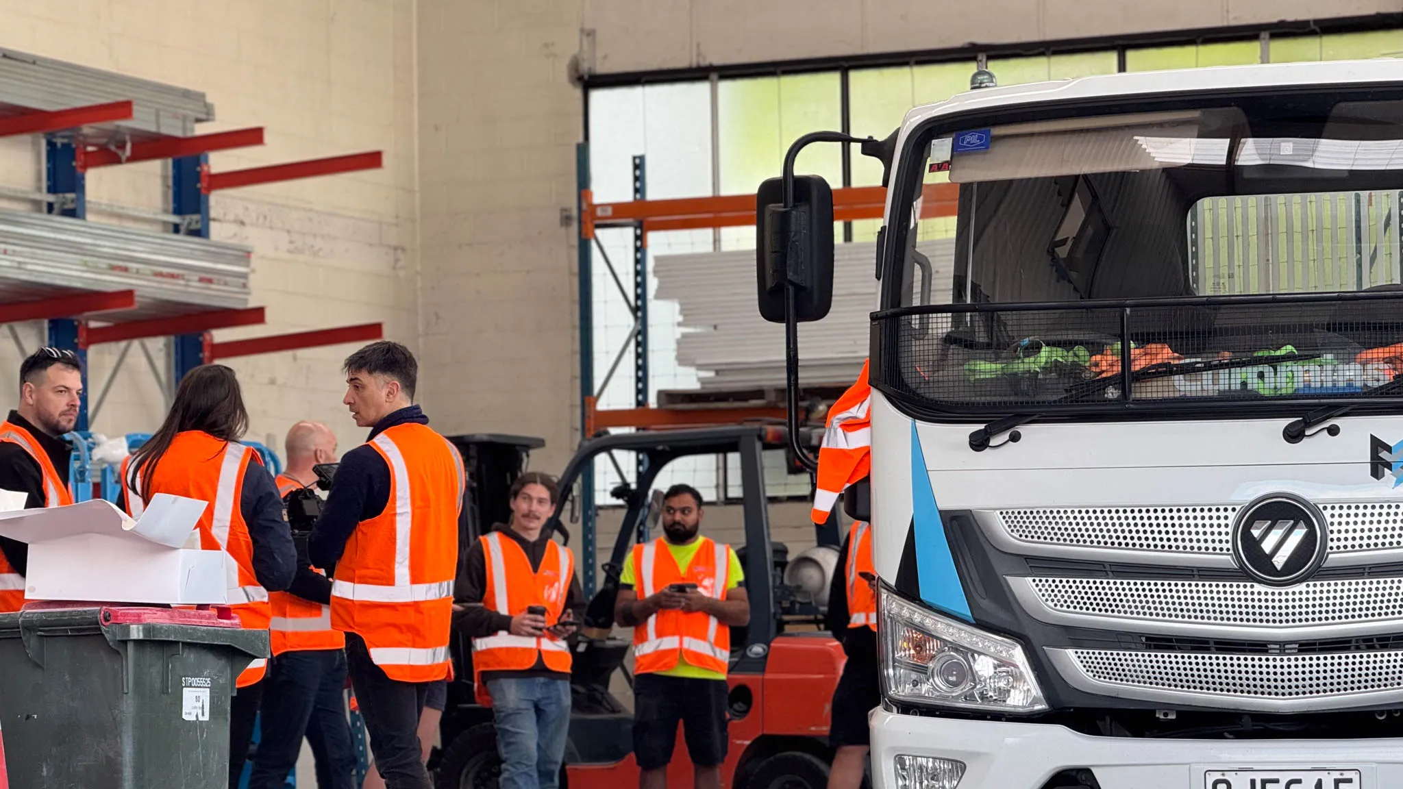 group of workers in a warehouse