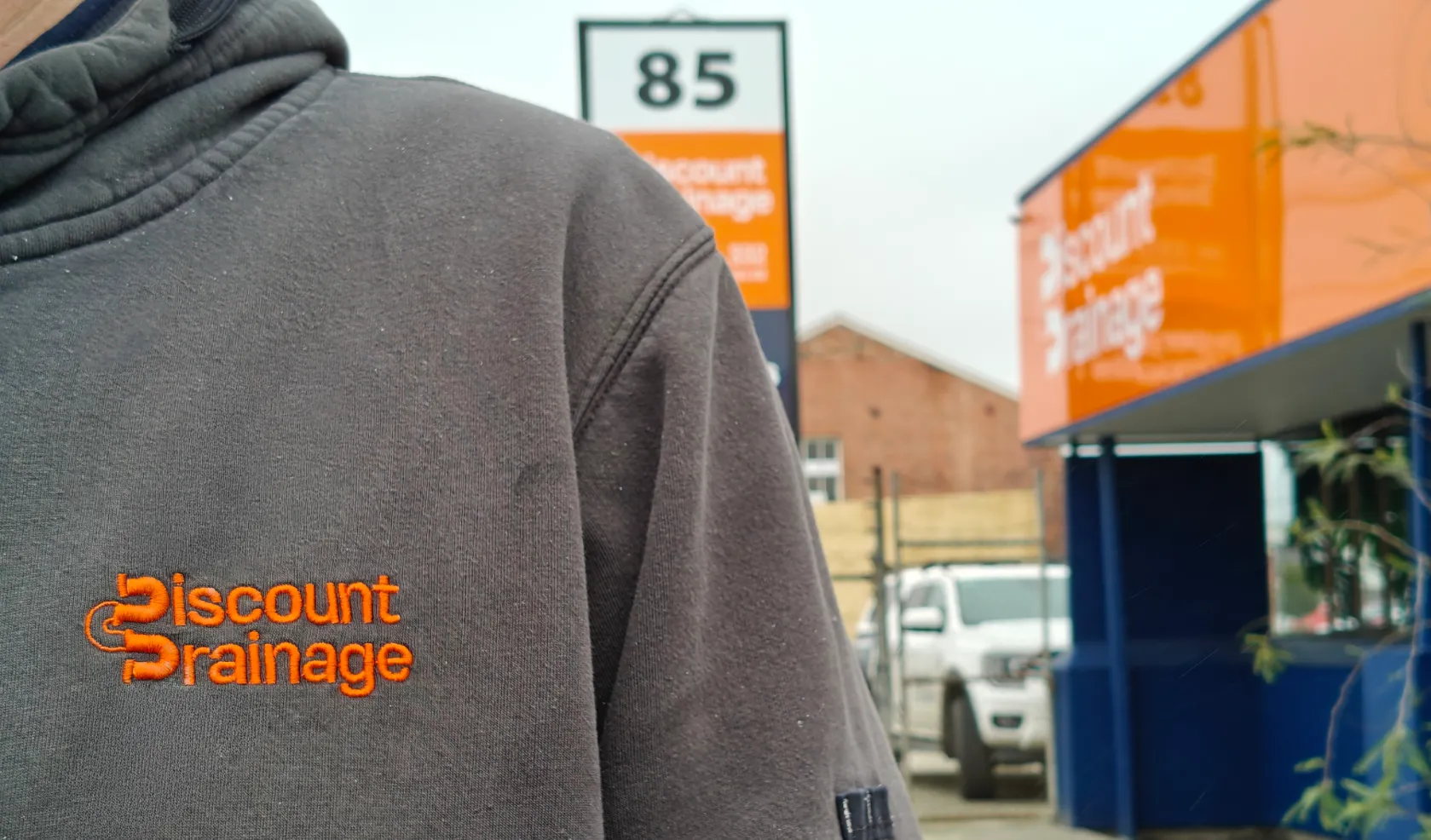 Man standing at front of a store