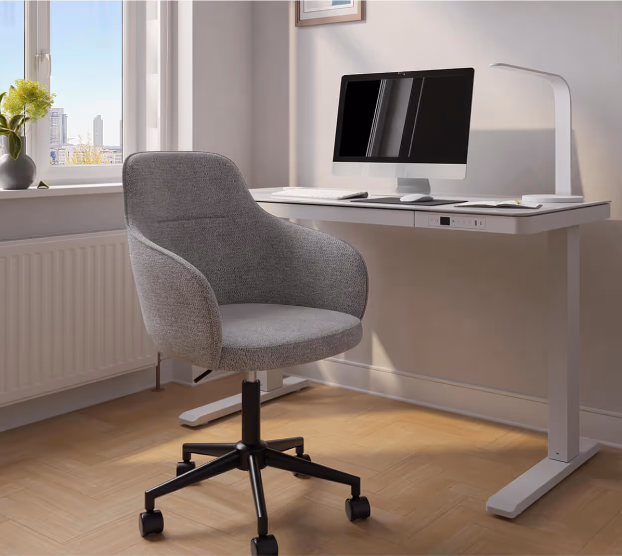 Office furniture bundle showing the Alma office chair with the Juno 4.0 height adjustable desk in White