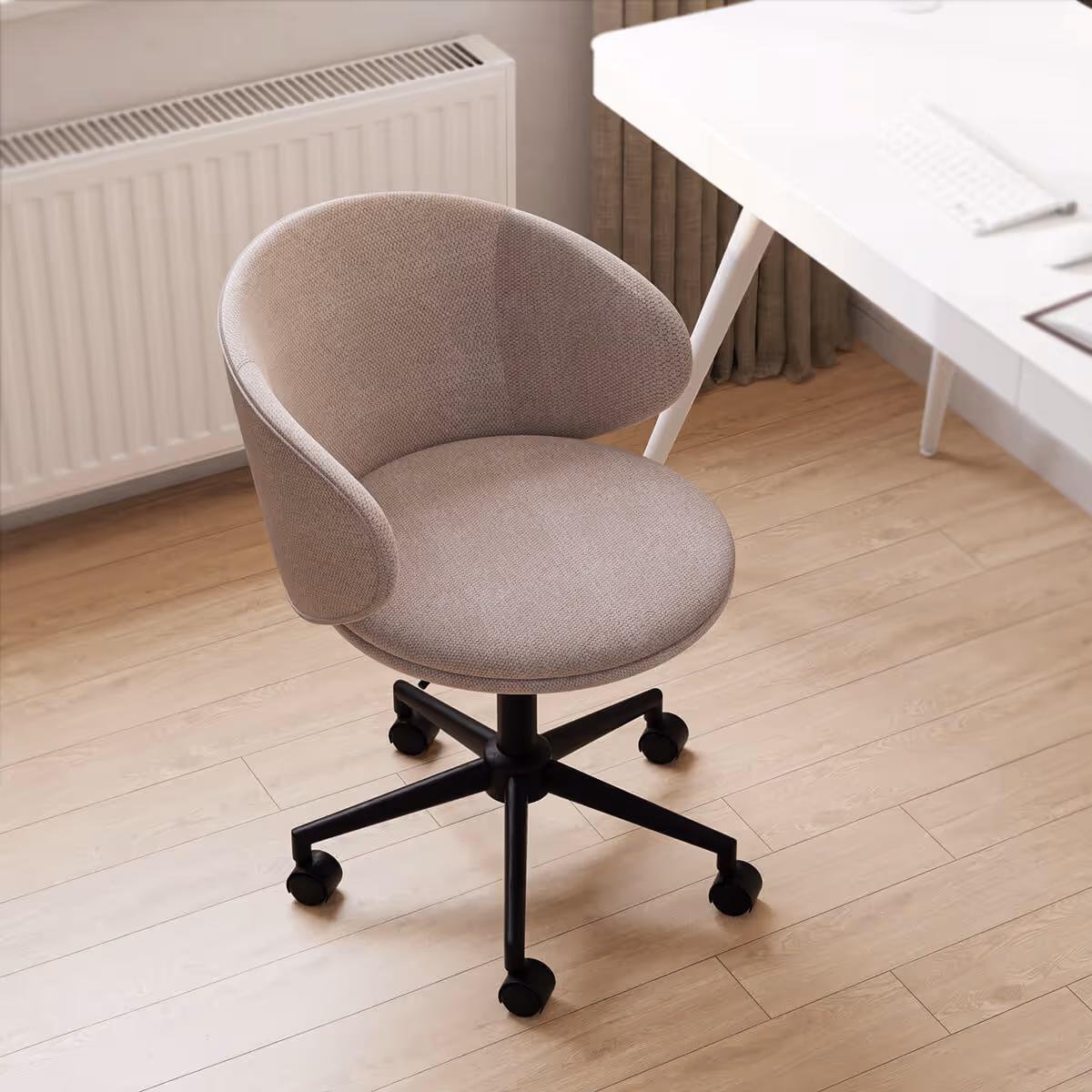 Hedda chair infront of the Gino sit stand desk
