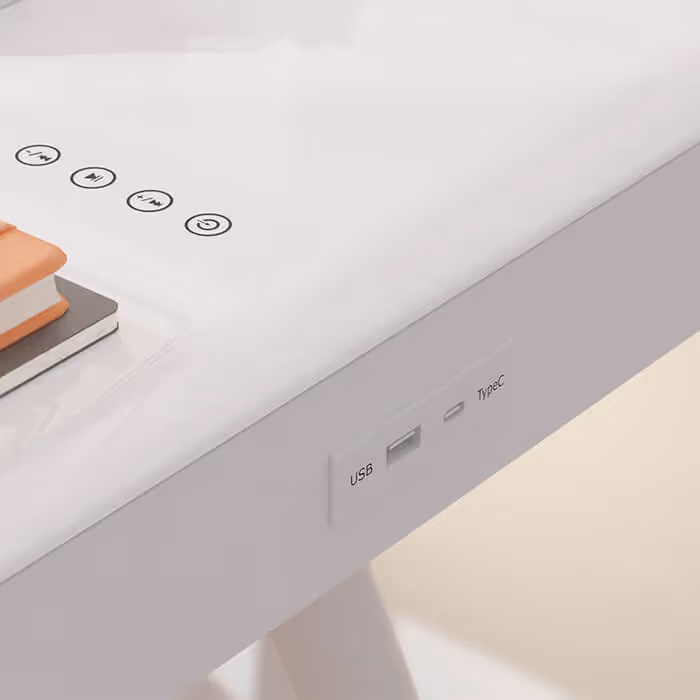 Close up of Tori office desk controls and inputs