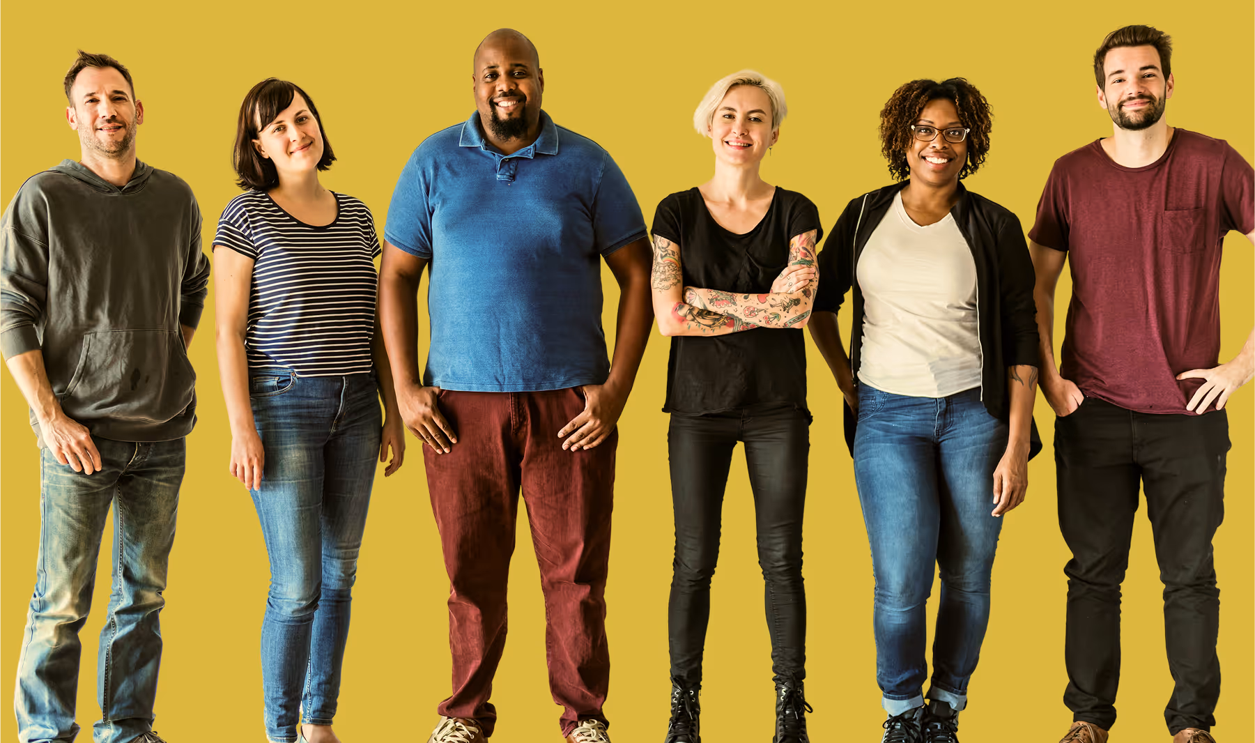 A group of five people standing together.