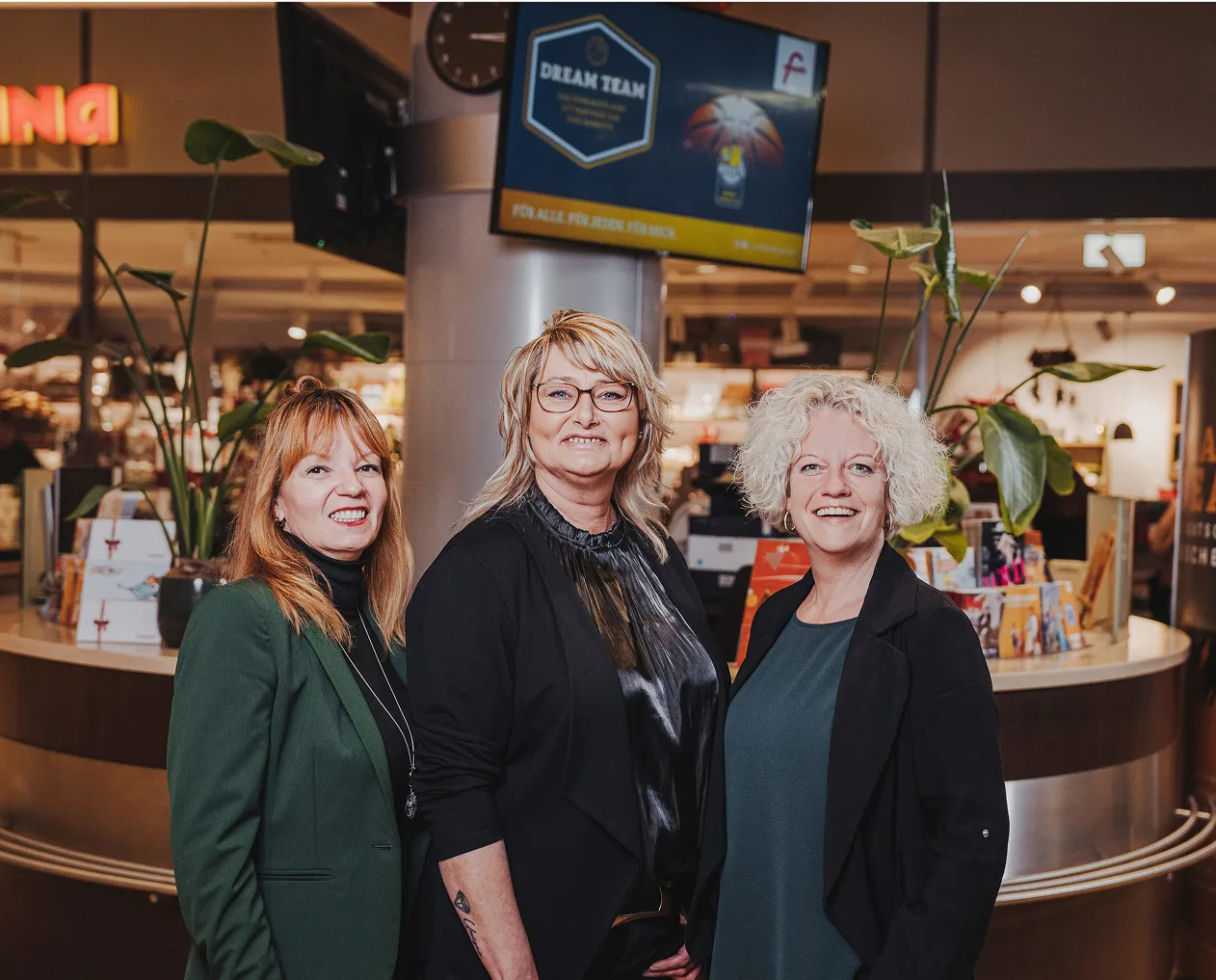 Freundliches Service-Team des Einkaufslands – für ein rundum angenehmes Einkaufserlebnis.