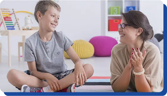 Counsellor supporting child through emotional wellbeing conversation