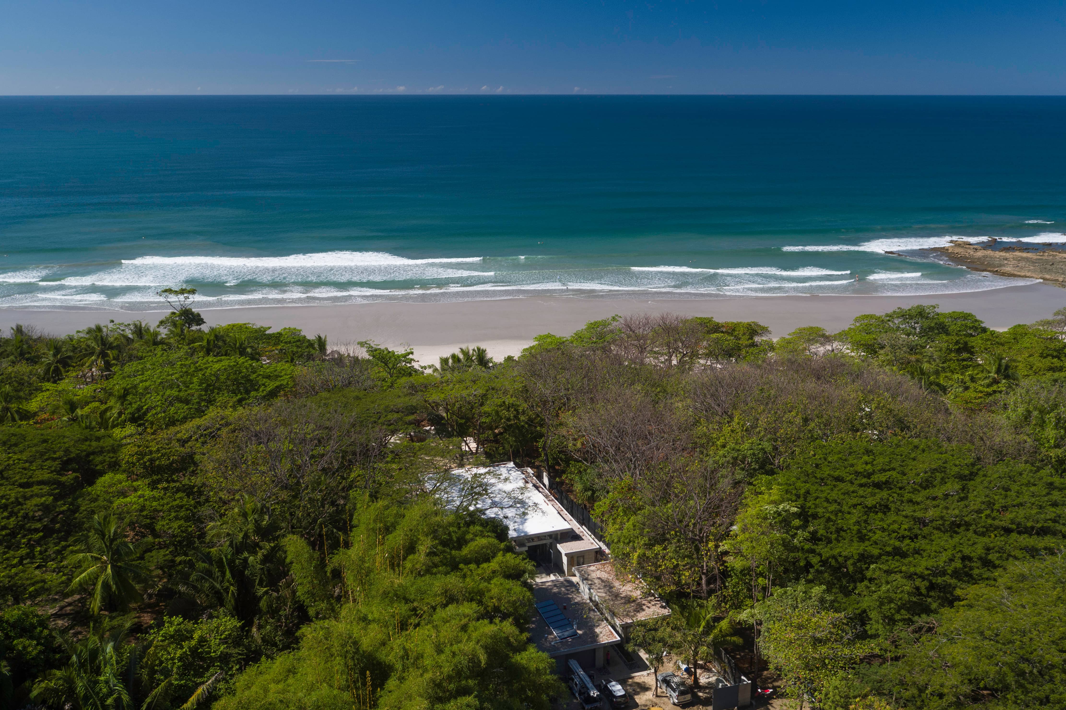 Aerial view Santa Teresa Costa Rica beach jungle villa Pacific surf waves