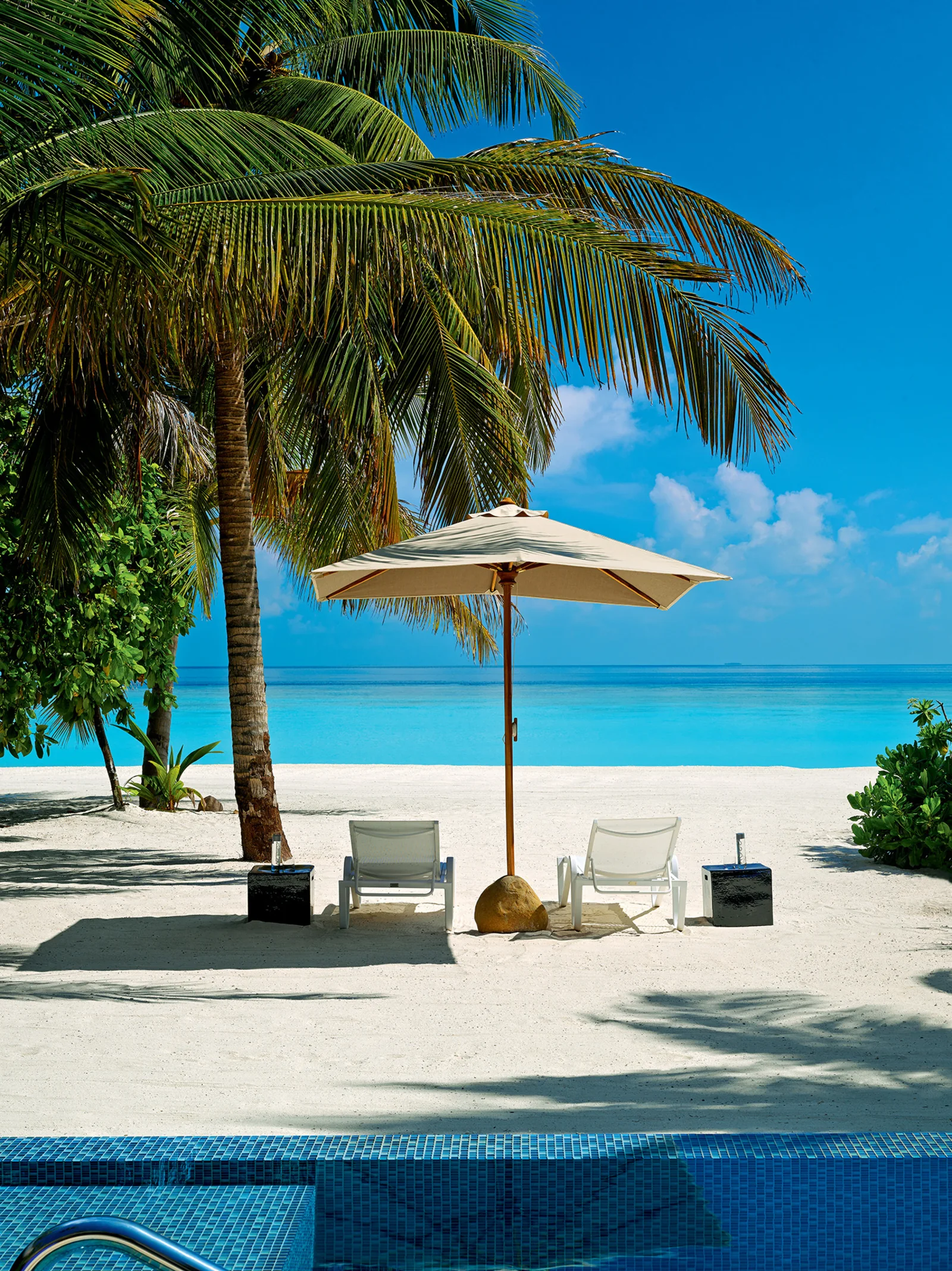 Deluxe Beach Pool Villa and beach at Velaa Private Island