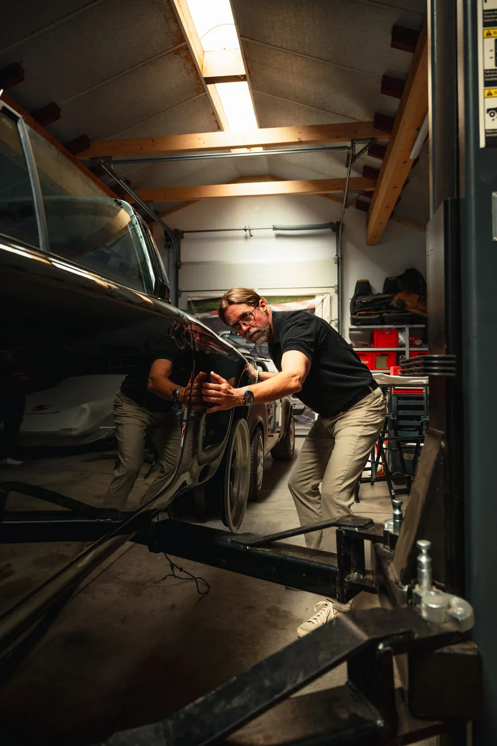 Marco Hinderer of PRINZIP R checking a restomod project