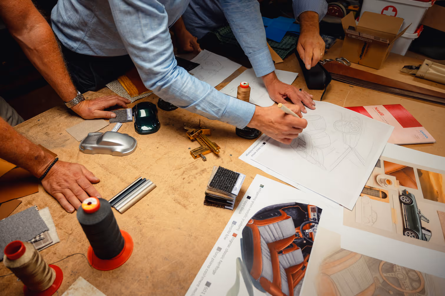 PRINZIP R team sketching the outline of a Porsche restomod project