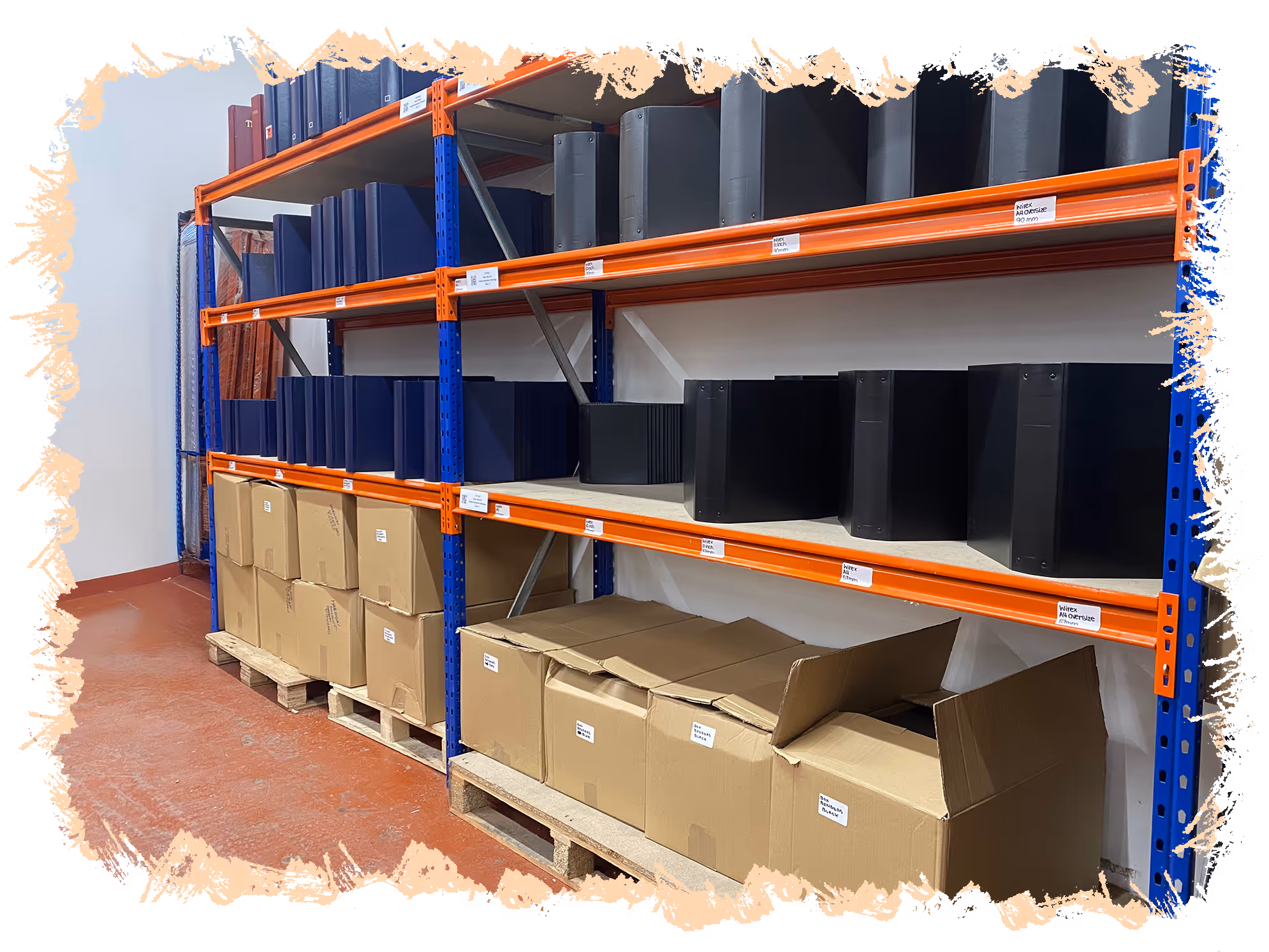 Warehouse shelving with black and blue binders on upper shelves and cardboard boxes on lower pallets.