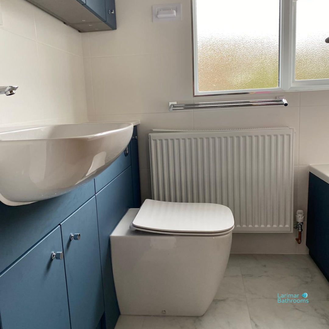 Newly renovated bathroom with Karndean flooring and electric shower