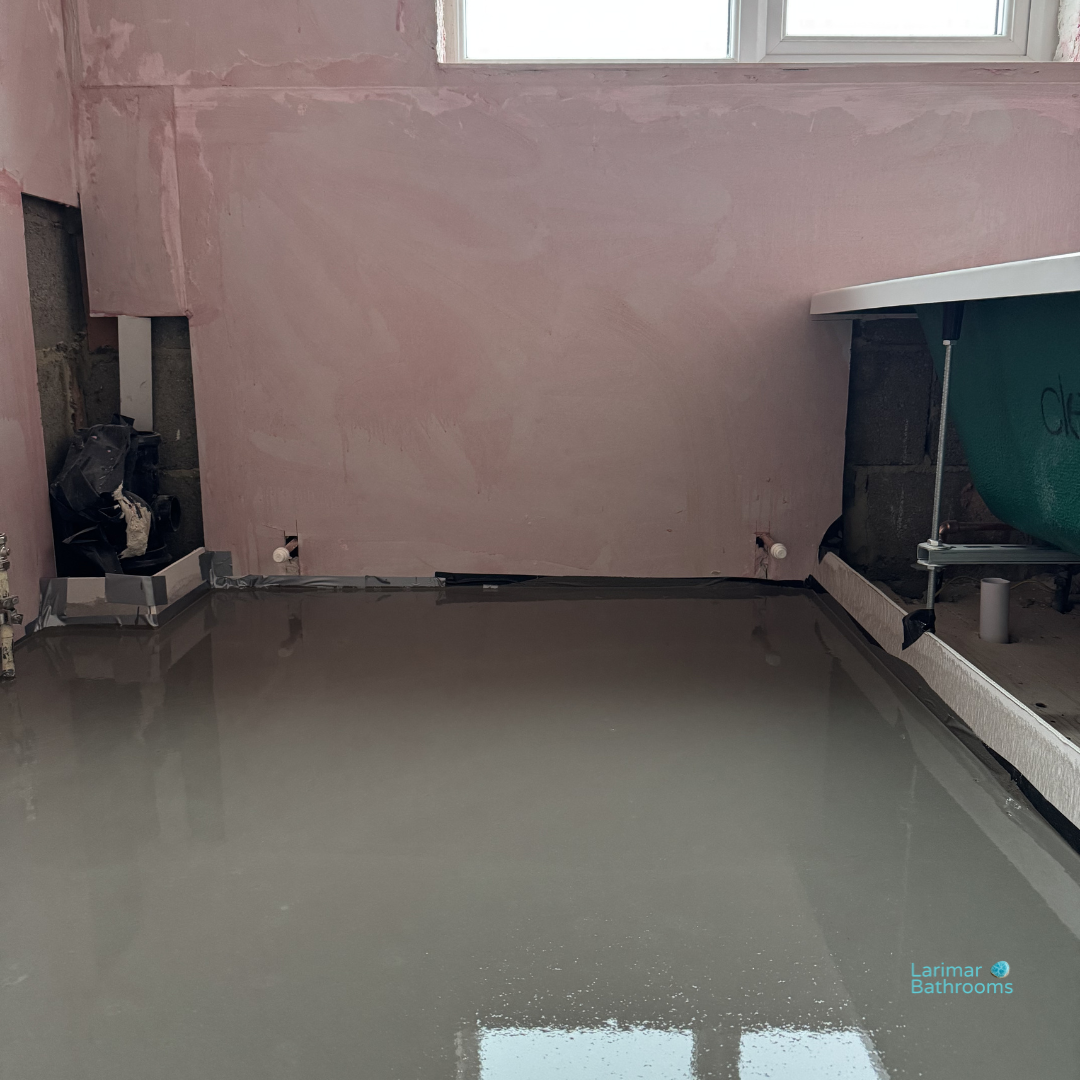Reboarded bathroom walls and latexed floor providing flat surface for ceramic tiles