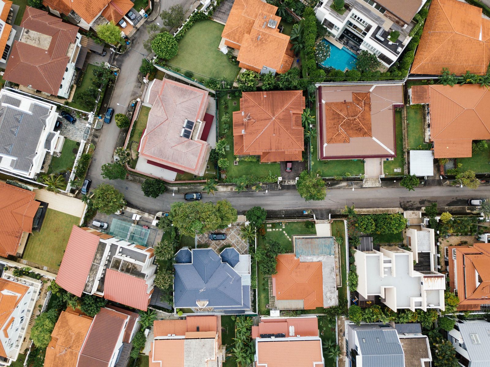 A neighborhood of large homes with a view from above.