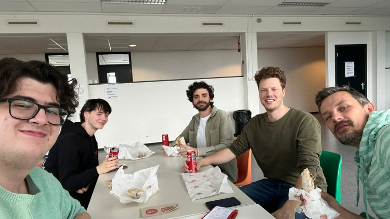 group of colleagues sitting together for lunch