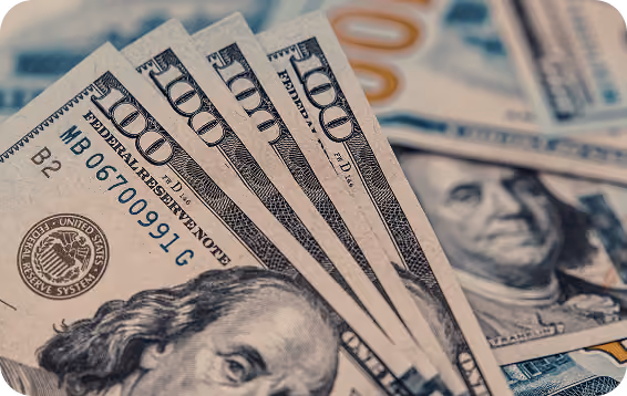 $100 bills in a large stack