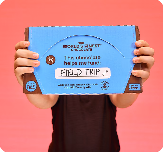 Fundraising participant holding out a case of WFC chocolates.