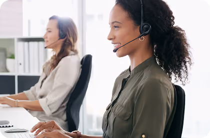 Two customer service representatives on the phone