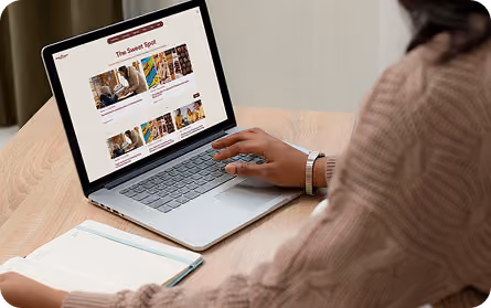 A woman on a laptop on the World’s Finest Chocolate website