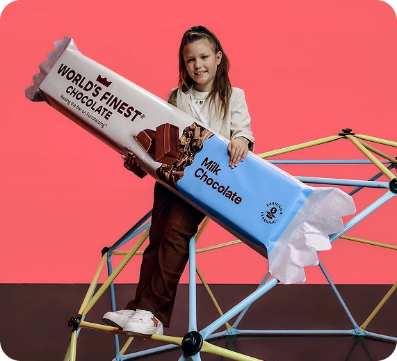 Girl holding a giant WFC chocolate bar.