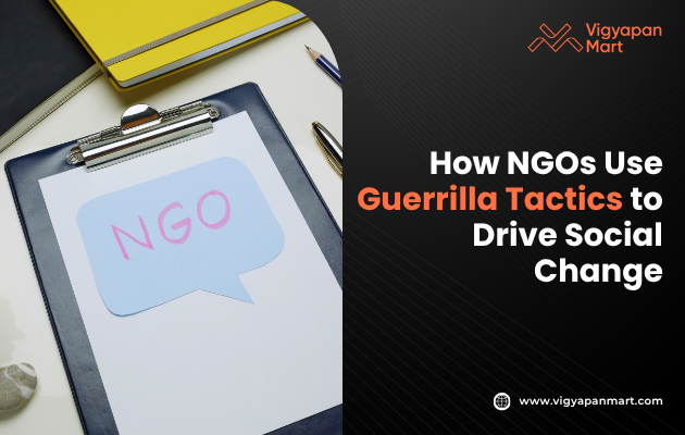 Clipboard with a speech bubble labeled "NGO" on a desk with a pen and notebook, alongside text highlighting NGO guerrilla tactics for social change.