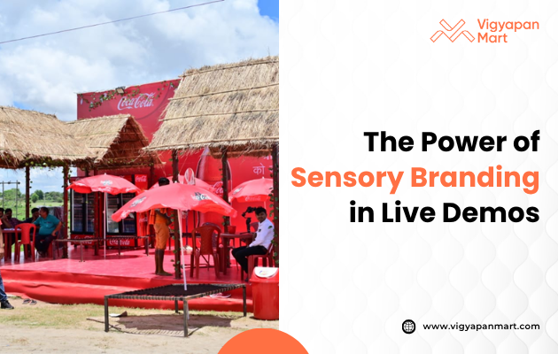 Outdoor market stall with straw roof, red Coca-Cola branding, and red umbrellas. People are sitting and interacting. Text reads, "The Power of Sensory Branding in Live Demos." Bright, inviting scene.