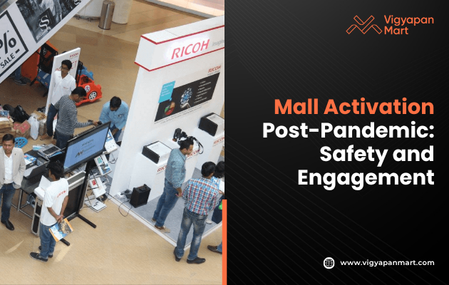 Overhead view of a mall activation event with people engaging at a Ricoh booth. Display screens and product demos suggest a tech-focused environment. The tone is lively and engaging.