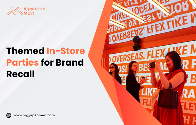 Vibrant in-store event with people taking photos. Orange backdrop with bold text creates an energetic atmosphere promoting brand recall.