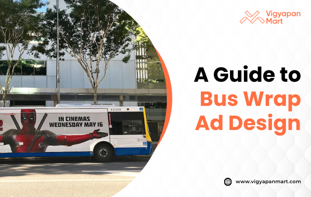 City bus with a colorful wrap ad featuring a superhero promoting a movie premiere on May 16. Trees and a modern building in the background.