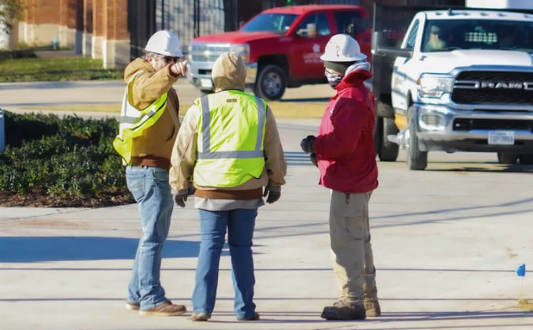 Image of a conversation between Landmark employees