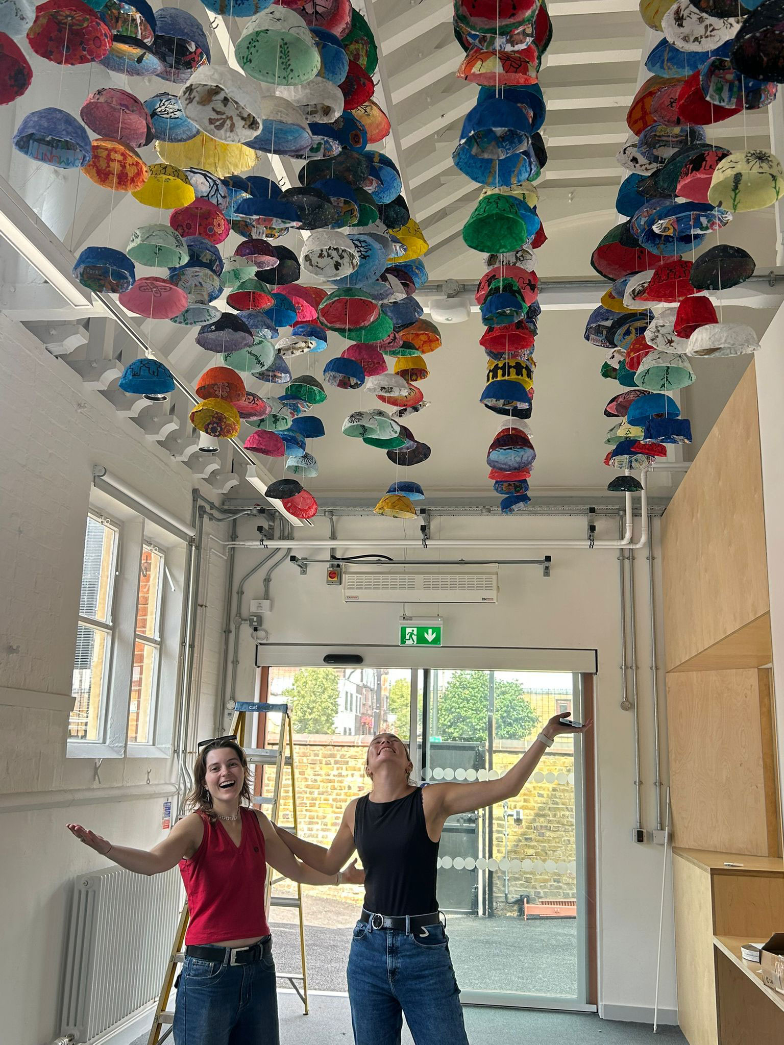 The 260 bowls being installed, in each class students created bowls with a
different theme, together symbolising the togetherness and community of the school.