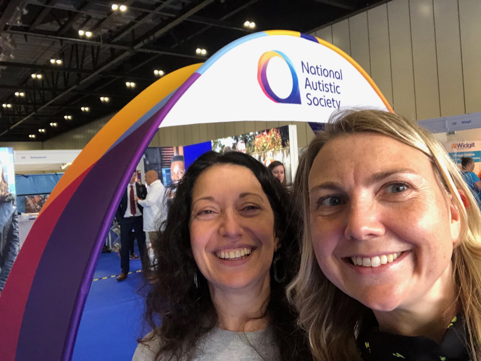  A photo of Melanie (Left) and Claire (Right) at the National Autistic Society stall. 