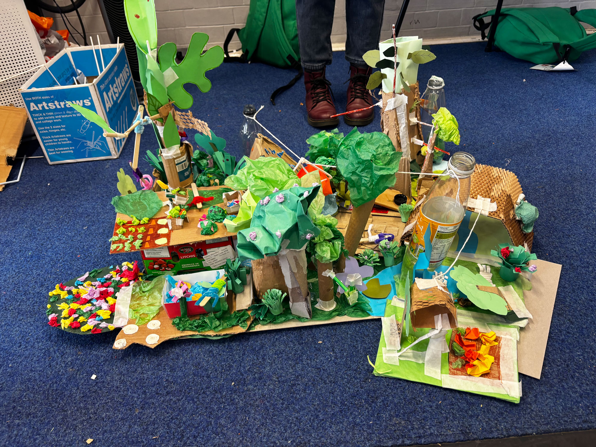 A wide shot of the full model, with paper trees, pipe cleaner gardens and card caves.