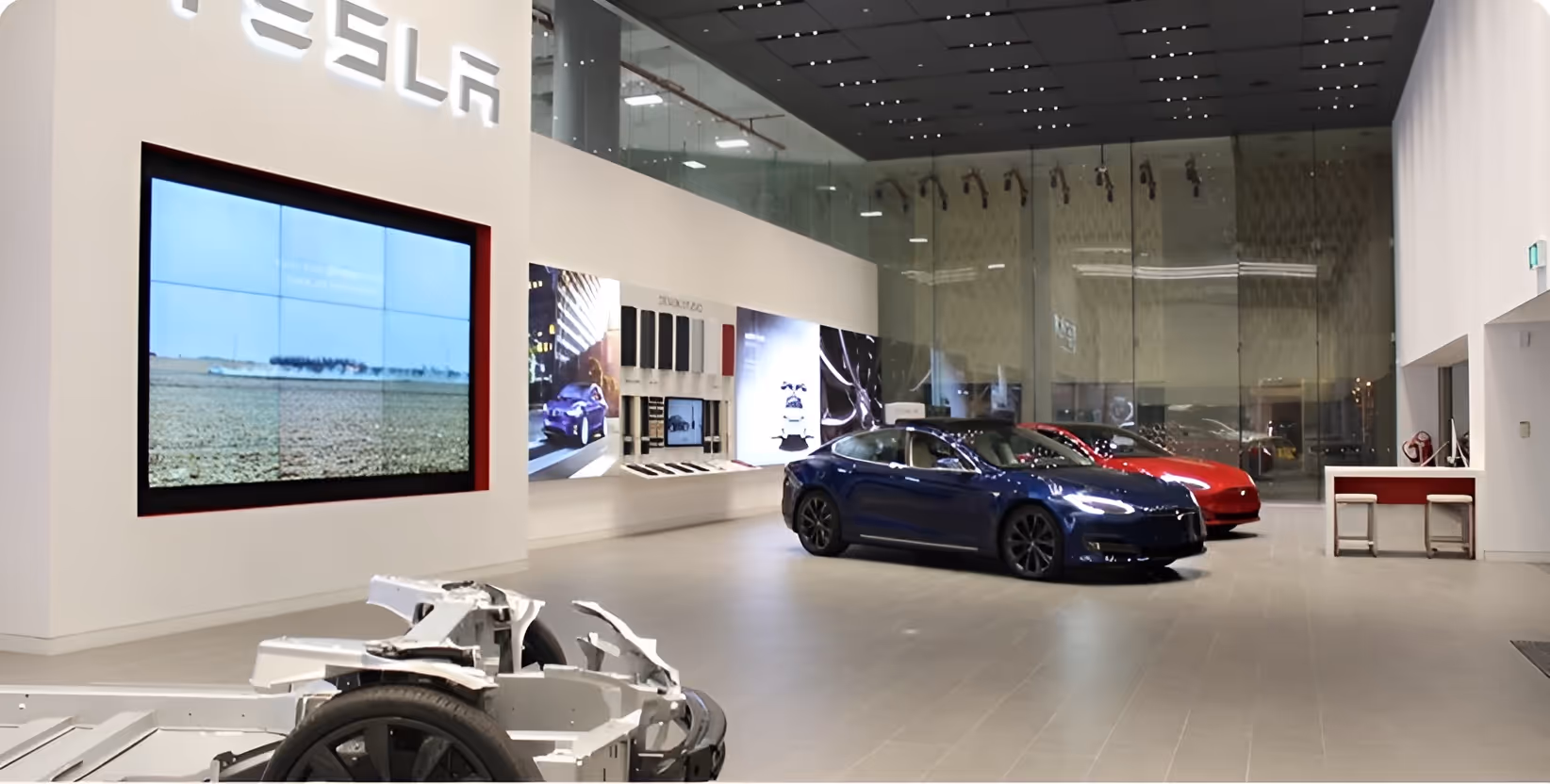 A modern car showroom with contemporary cars.