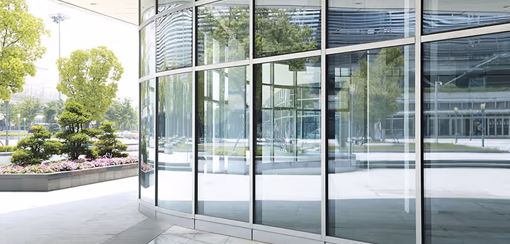 A modern building with a glass entrance.