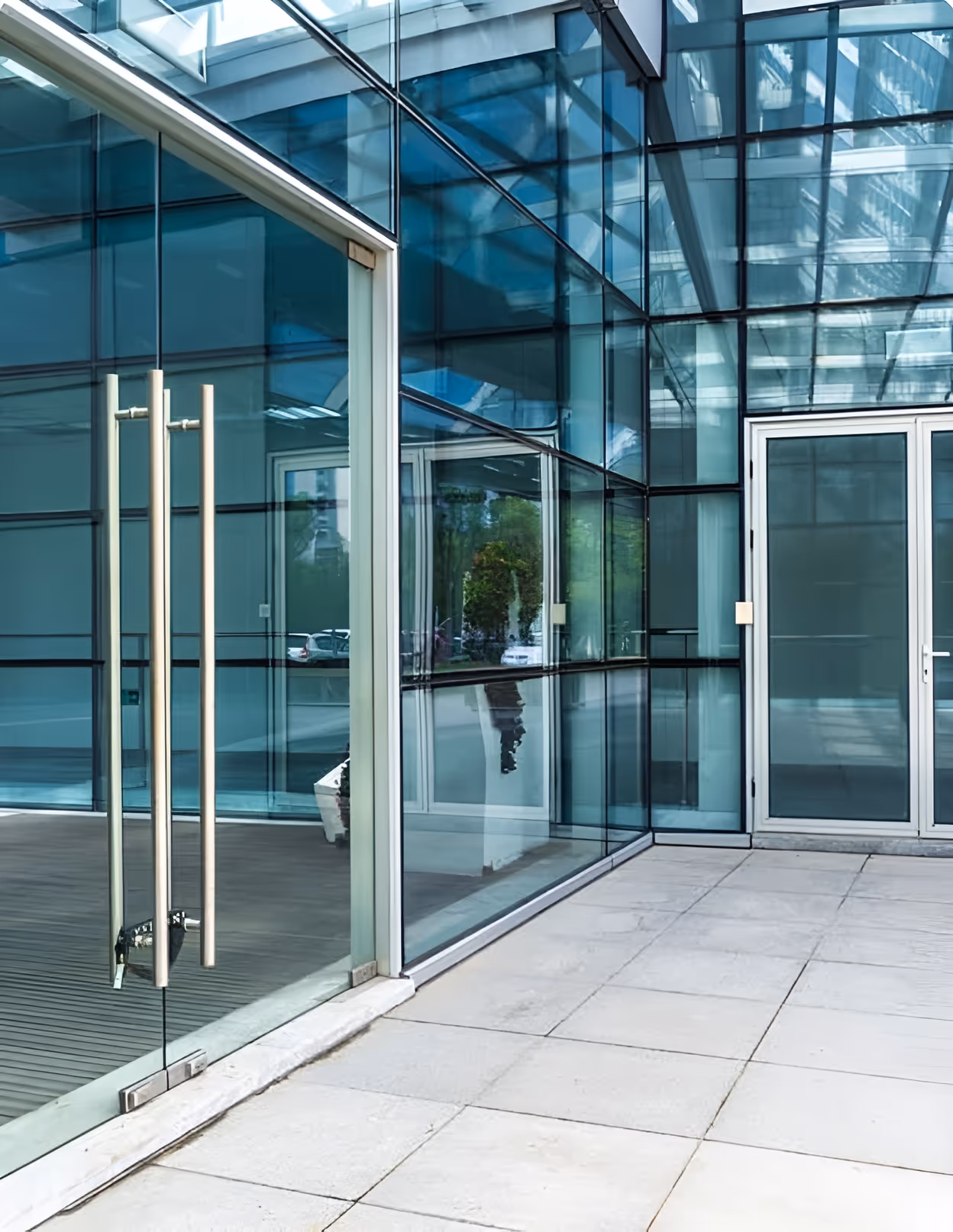 A modern glass entrance to a building.