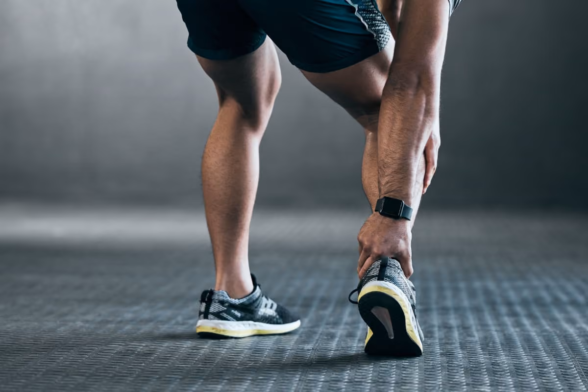 Athlete with pain in the back of his ankle into the foot, illustrating sinus tarsi pain and the need for treatment options from the best podiatrist in Los Angeles, CA.